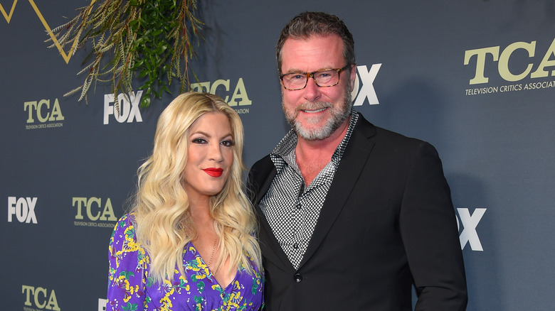 Tori Spelling and Dean McDermott arriving at event