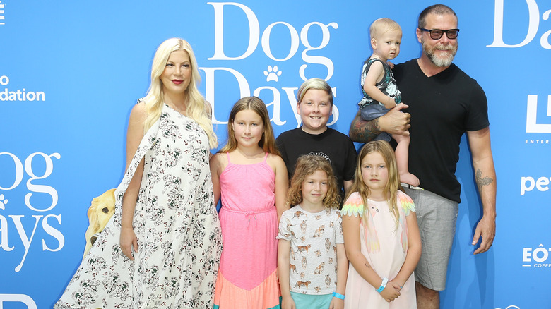 Tori Spelling, Dean McDermott, and kids attending premiere event