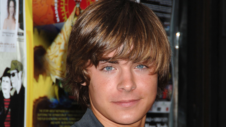 Zac Efron long bangs smiling