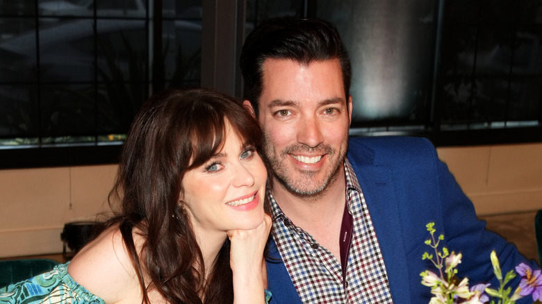Zooey Deschanel sits with Jonathan Scott