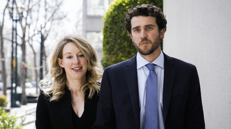 Elizabeth Holmes and Billy Evans smile