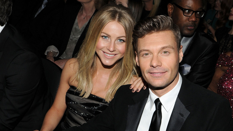 Julianne Hough and Ryan Seacrest seated side by side
