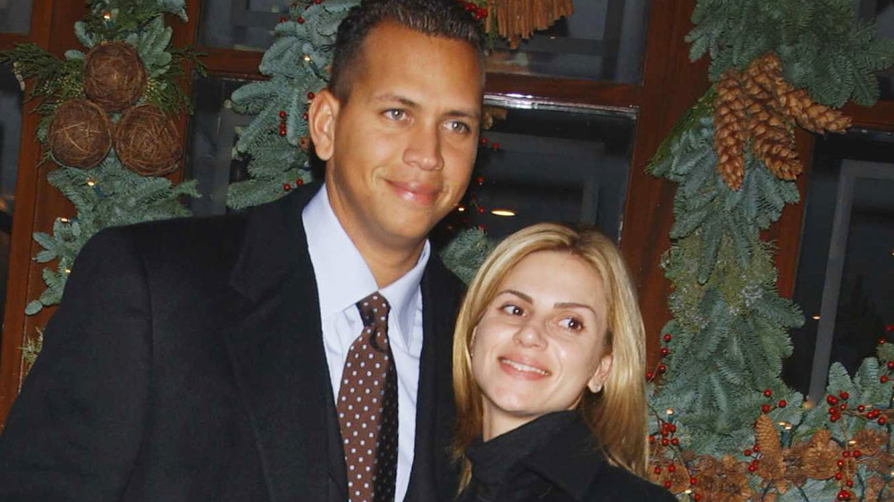 Alex Rodriguez and Cynthia Scurtis smiling