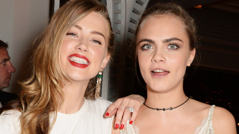 Amber Heard and Cara Delevingne together