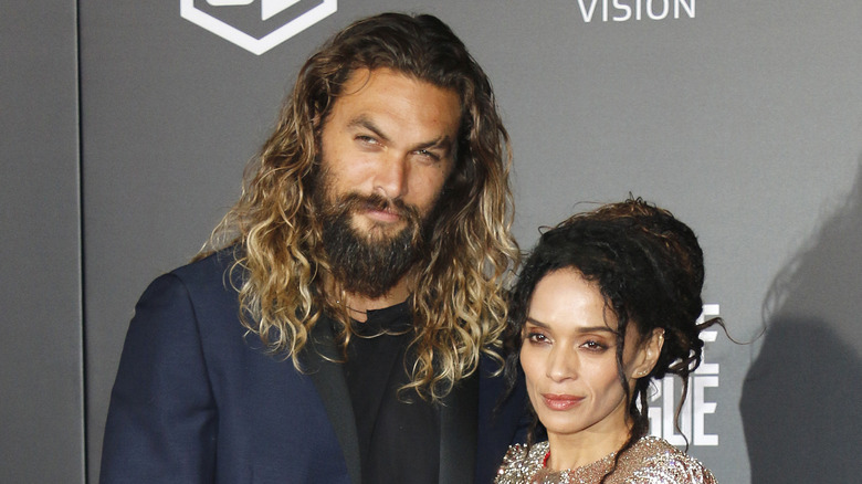 Jason Momoa and Lisa Bonet posing together