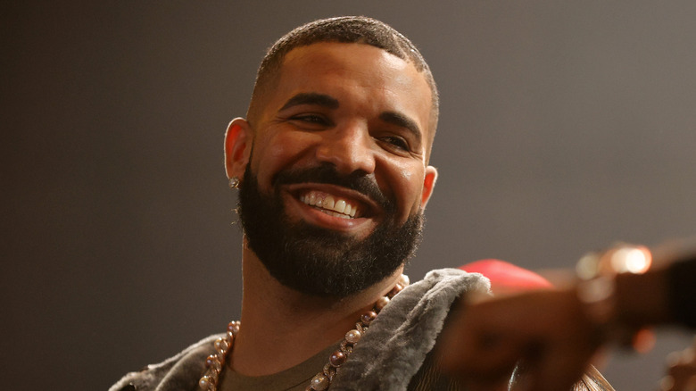 Drake smiling