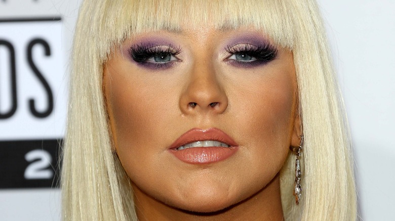 Christina Aguilera with a neutral expression