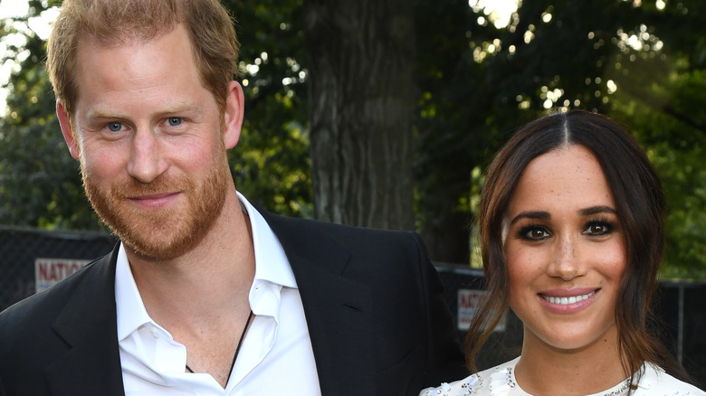 Prince Harry and Meghan Markle smiling together