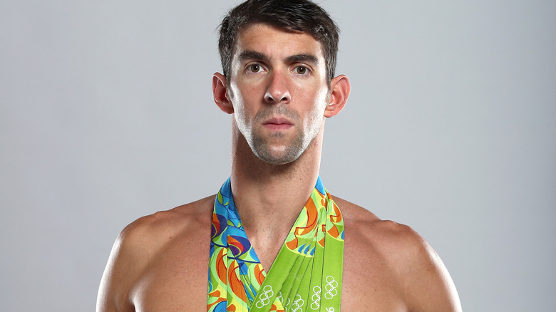 Phelps with medals around his neck