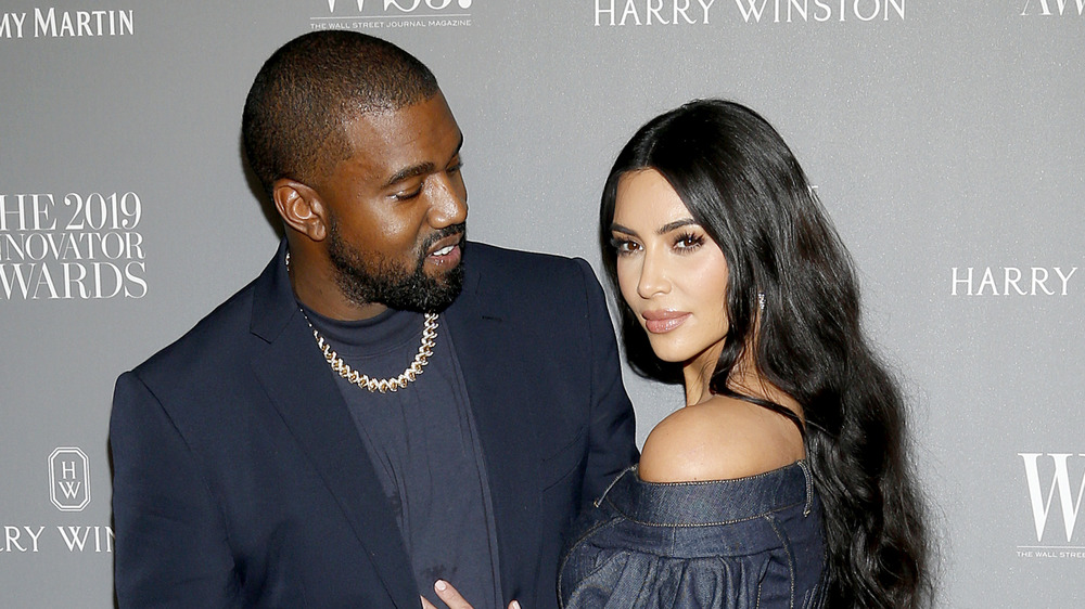 Kanye West looking at Kim Kardashian
