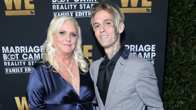 Jane and Aaron Carter posing