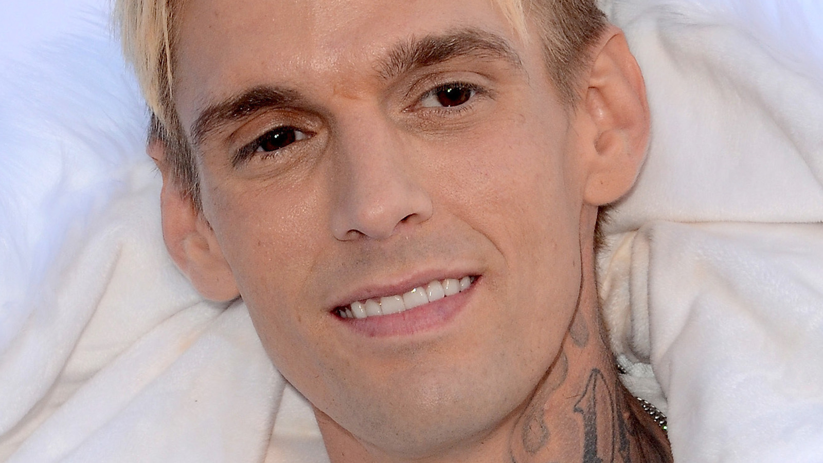 Aaron Carter Addresses Recent Drama and Shares the Meaning Behind His New  Face Tattoo Exclusive  Entertainment Tonight