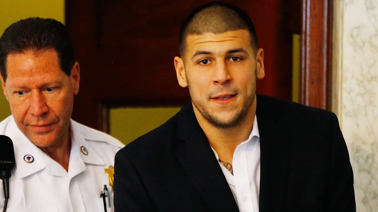 Aaron Hernandez handcuffed