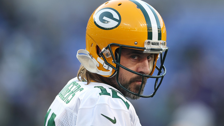 Aaron Rodgers looks over his shoulder