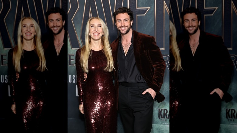 Sam and Aaron Taylor-Johnson smiling while posing together on the red carpet