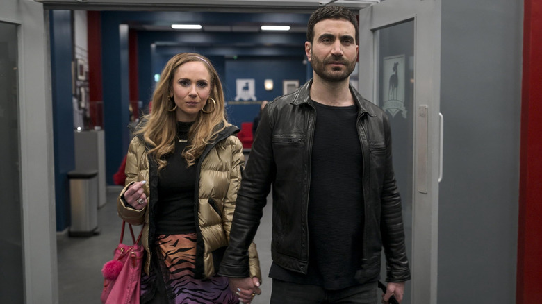 Keeley (Juno Temple) holds hands with Roy (Brett Goldstein) in Ted Lasso episode Headspace
