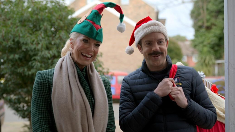 Rebecca (Hannah Waddingham) and Ted Lasso (Jason Sudeikis) celebrate Christmas in Carol of the Bells