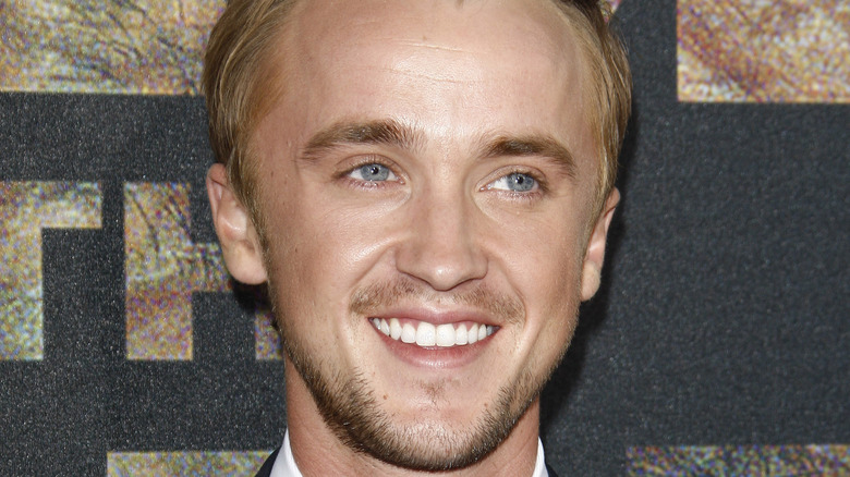 Tom Felton smiling