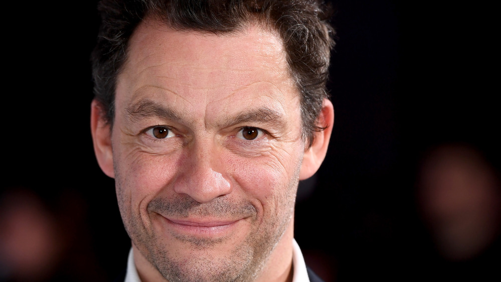 Dominic West poses
