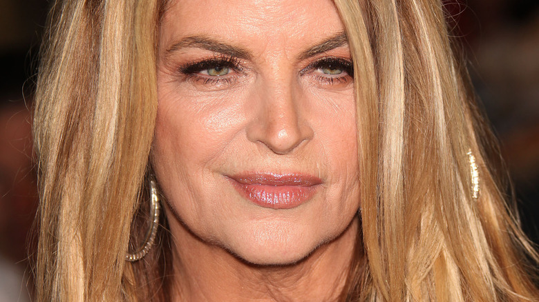 Kirstie Alley looking to the side with slight smile