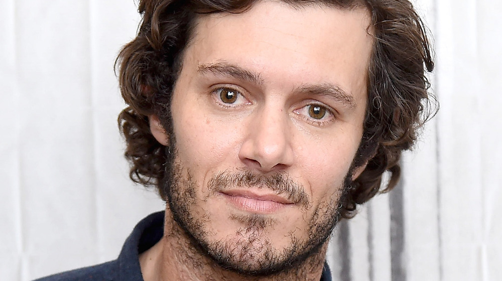 Adam Brody staring at camera