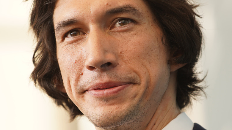 Adam Driver smiling at an event
