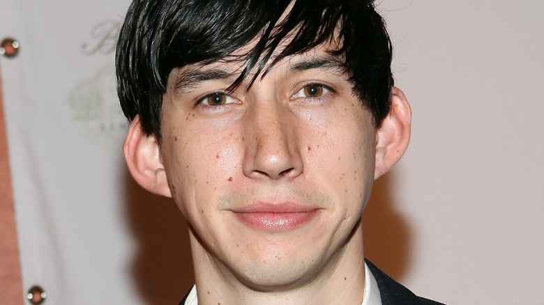 Young Adam Driver smiling