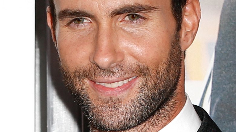 Adam Levine smiling