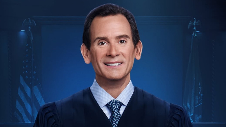 Adam Levy smiling on an official poster.