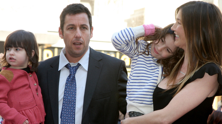 Adam Sandler with wife and daughters