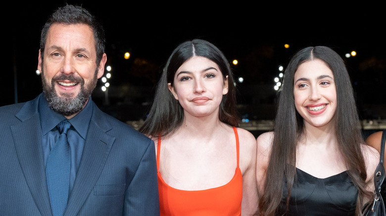 Adam, Sunny, and Sadie Sandler posing