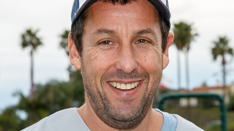 Adam Sandler on a baseball field