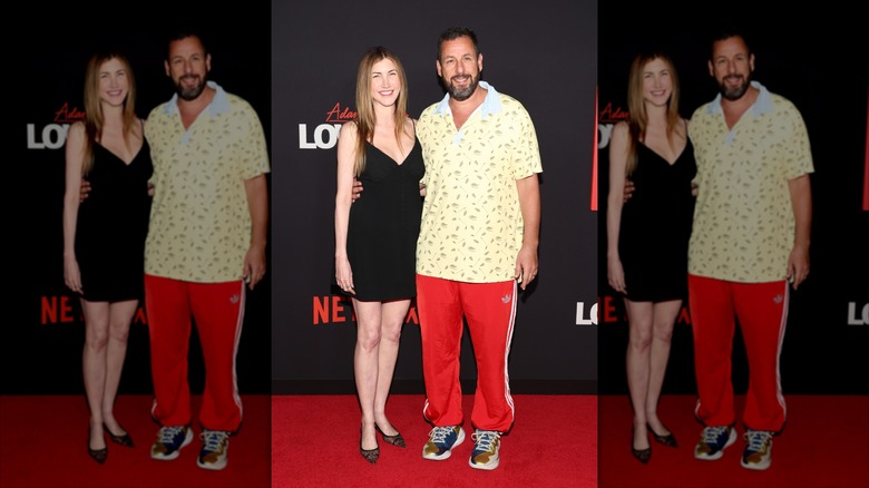 Adam Sandler posing with wife Jackie Sandler