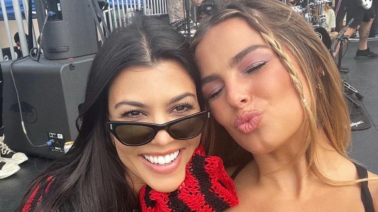Kourtney Kardashian and Addison Rae posing