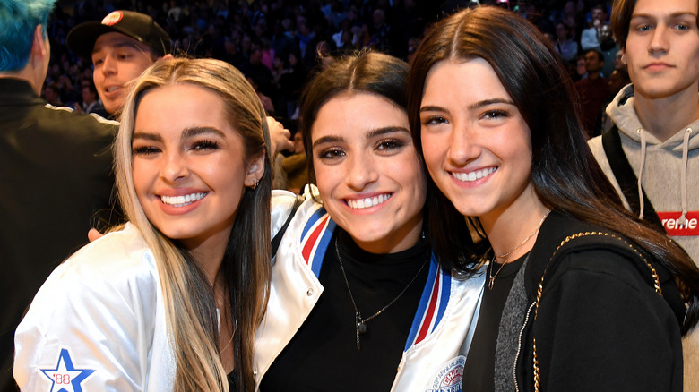 Addison Rae, Charli D'Amelio, and Dixie D'Amelio smiling