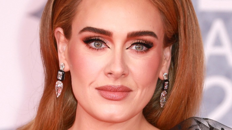 Adele with sparkling earrings