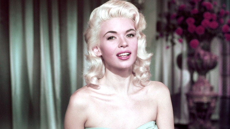 Jayne Mansfield wearing a strapless seafoam green dress with shoulder-length hair.
