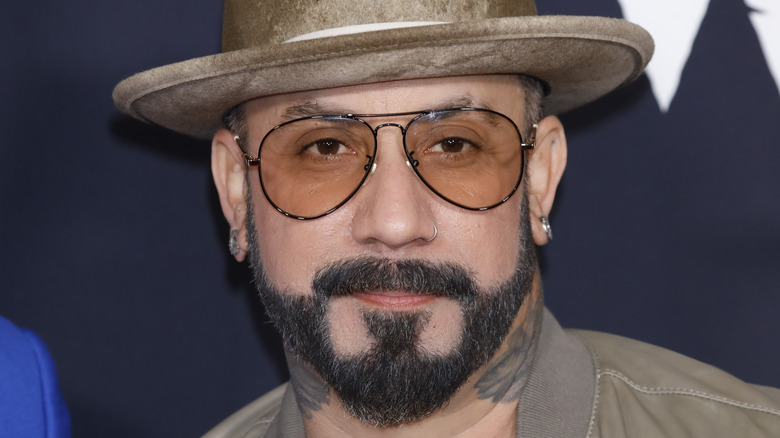 AJ McLean wears sunglasses red carpet