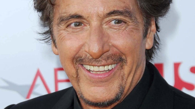 Al Pacino smiles on red carpet