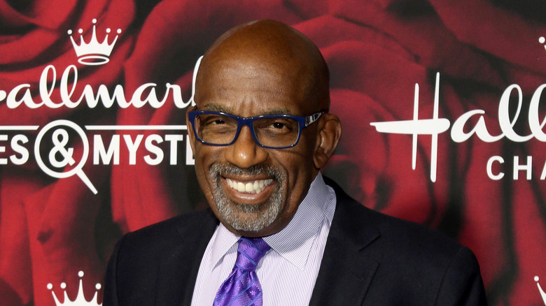 Al Roker smiling in blue glasses