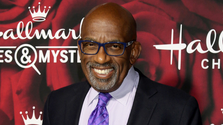 Al Roker smiling in blue glasses