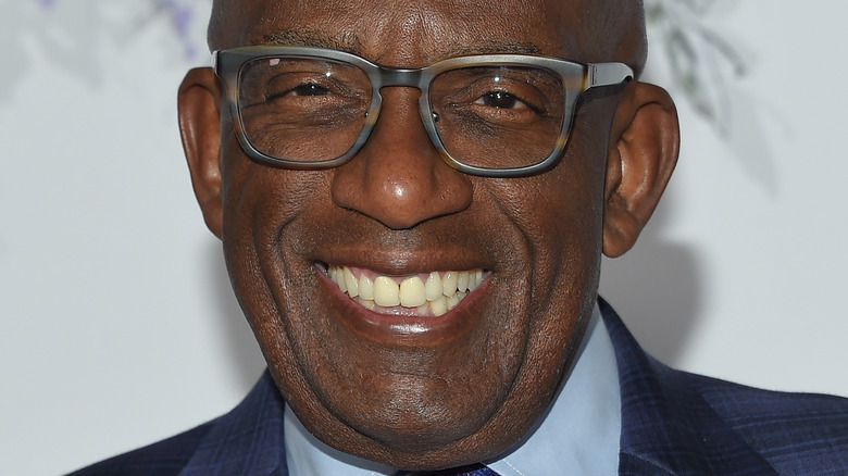Al Roker with wide smile and glasses