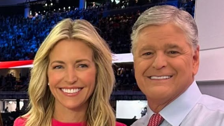 Ainsley Earhardt and Sean Hannity pose at the 2024 RNC