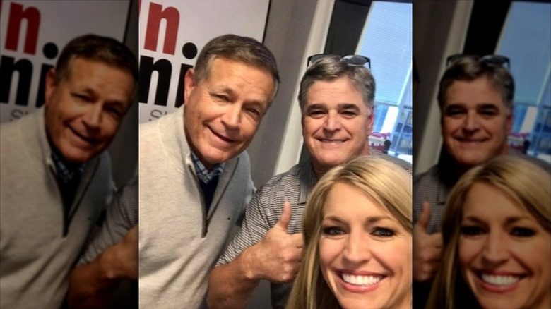 Ainsley Earhardt poses with Sean Hannity on his show in 2017