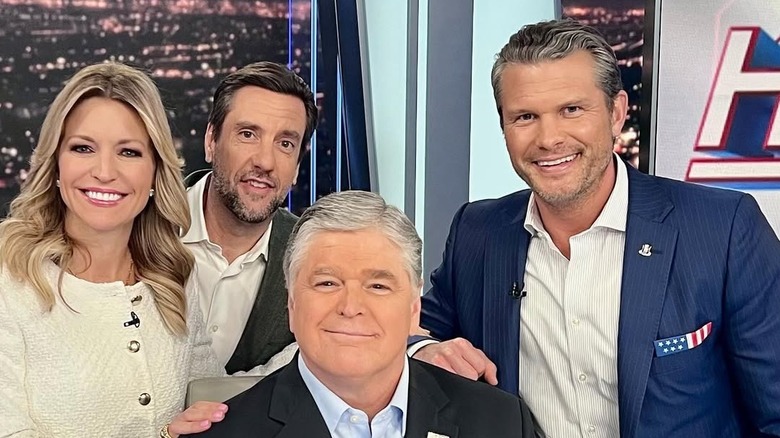 Ainsley Earhardt and Fox & Friends co-hosts pose with Sean Hannity