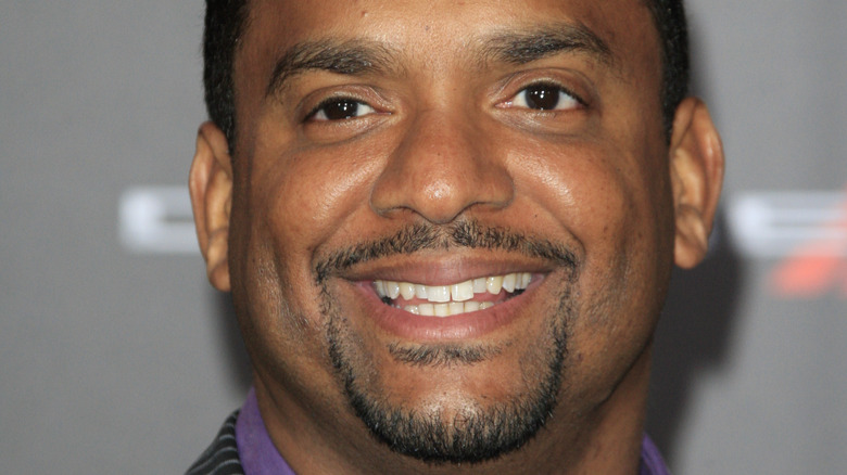 Alfonso Ribeiro posing at a premiere