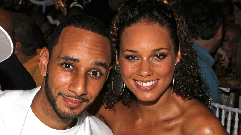 Alicia Keys and Swizz Beatz smiling