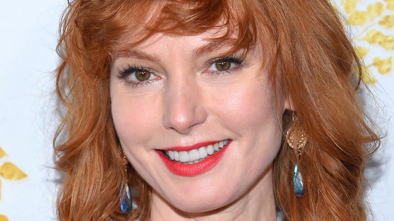 Alicia Witt grinning