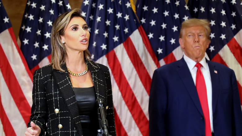 Alina Habba speaks next to Donald Trump in January 2024