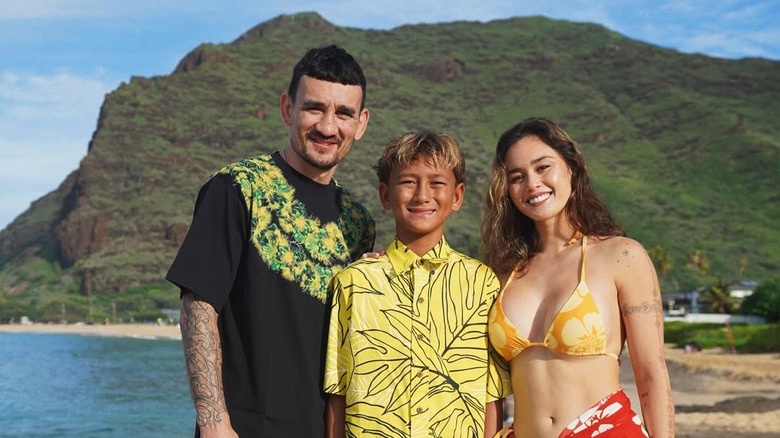 Max Holloway and Alessa Quizon pose with Rush